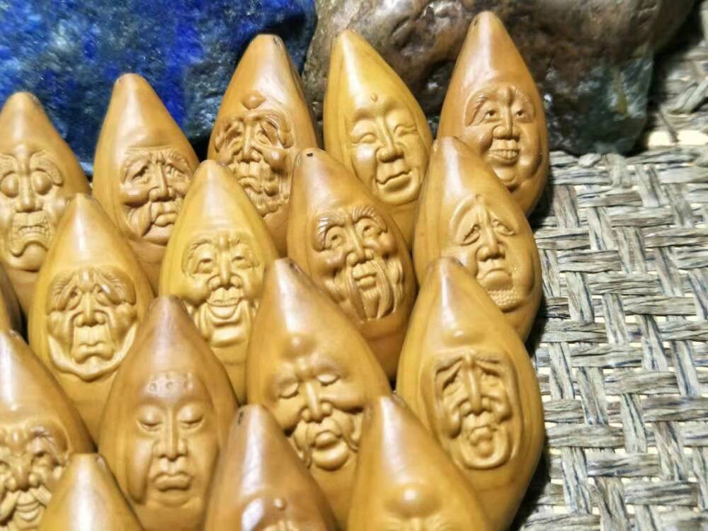 精美橄榄核雕刻原皮十八罗汉长串一条，
