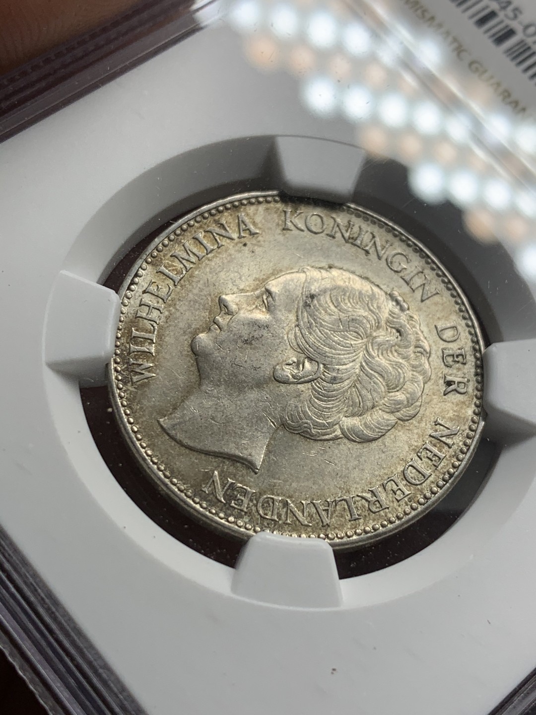 《竞宝斋》第50场-本周日，周一2场连拍（全场不限金额包邮） NGC MS62 淡彩 荷兰 1940年 1G 银币