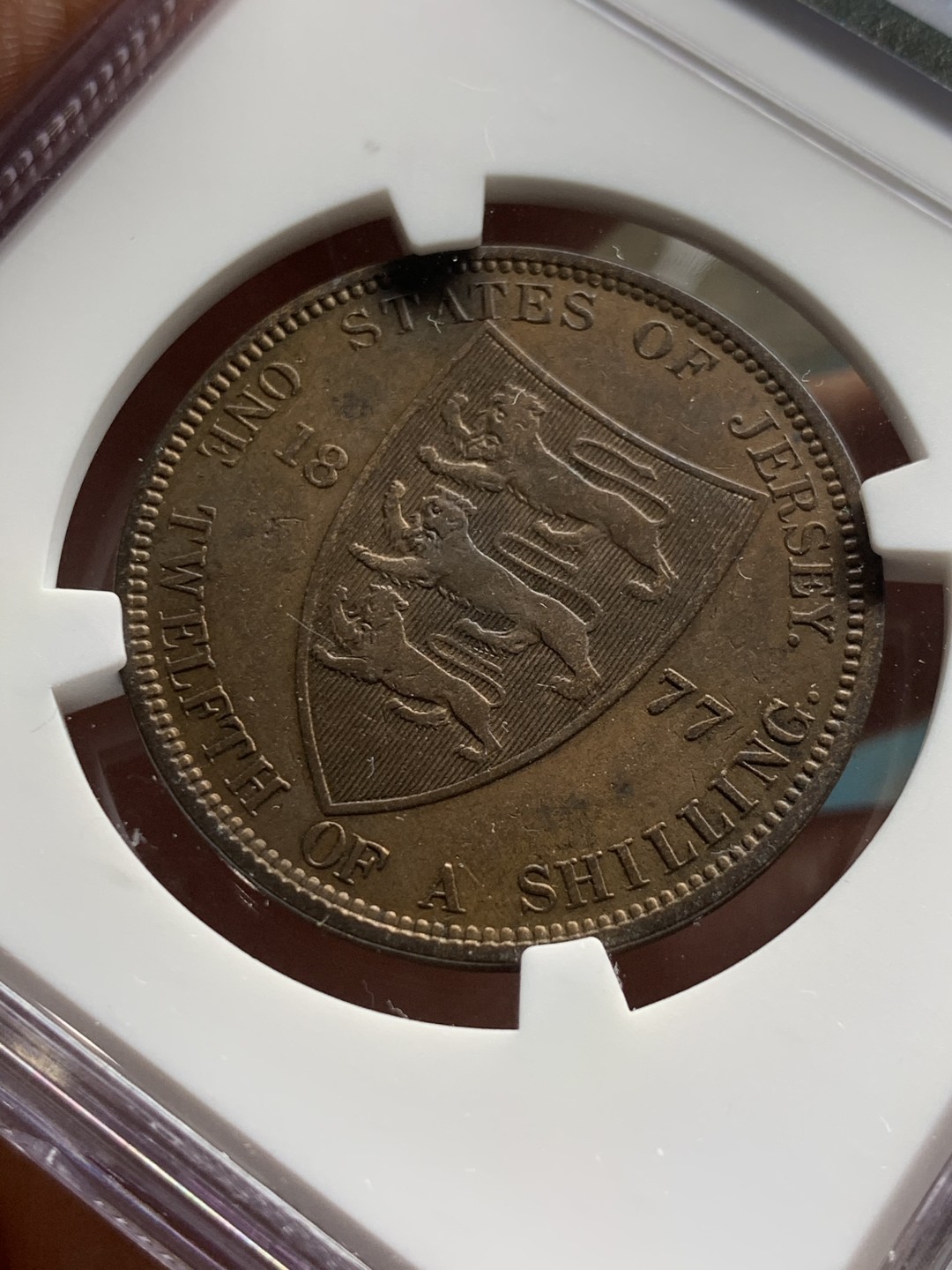 《竞宝斋》第51场-本周日，周一2场连拍（全场不限金额包邮） NGC AUD 1877 泽西1/12先令 铜币  