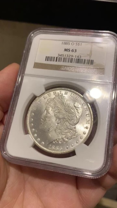 《竞宝斋》第51场-本周日，周一2场连拍（全场不限金额包邮） NGC-MS63 美国 1885年O版 1美元 摩根银币，NGC老盒，品相不错