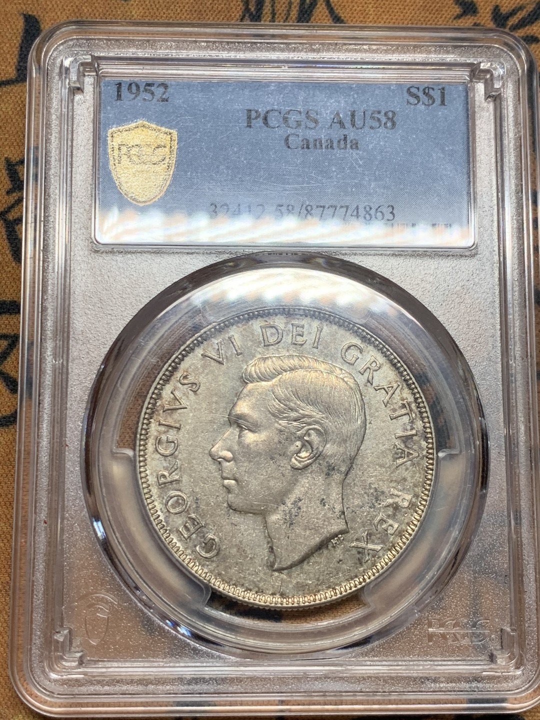 《竞宝斋》第52场-本周日，周一2场连拍（全场不限金额包邮） 1952年加拿大乔治六世划船银币 pcgs58分  划船热门品种 