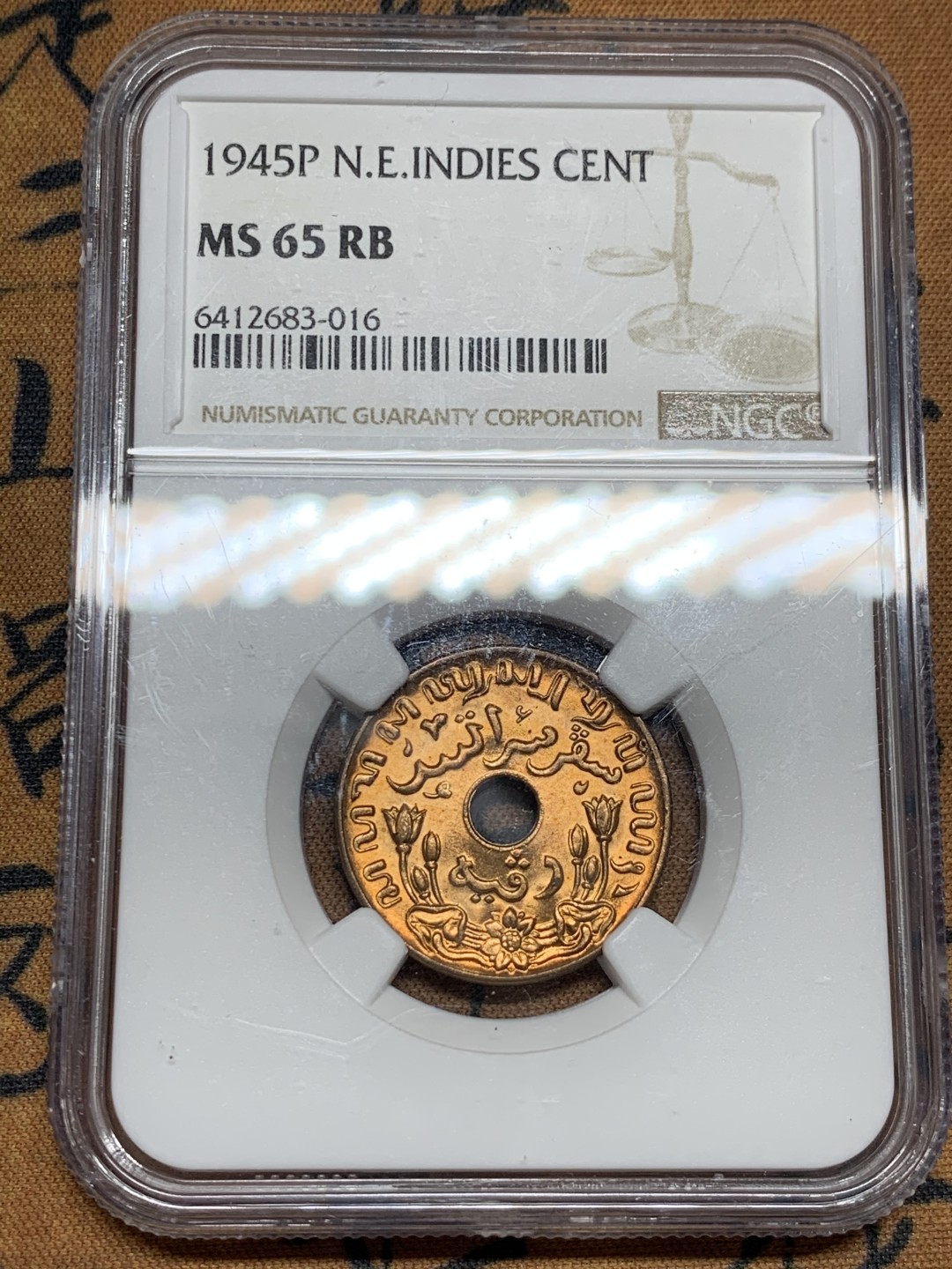 《竞宝斋》第52场-本周日，周一2场连拍（全场不限金额包邮） NGC MS65RB 1945年荷属东印度1分 铜光满满 流光溢彩