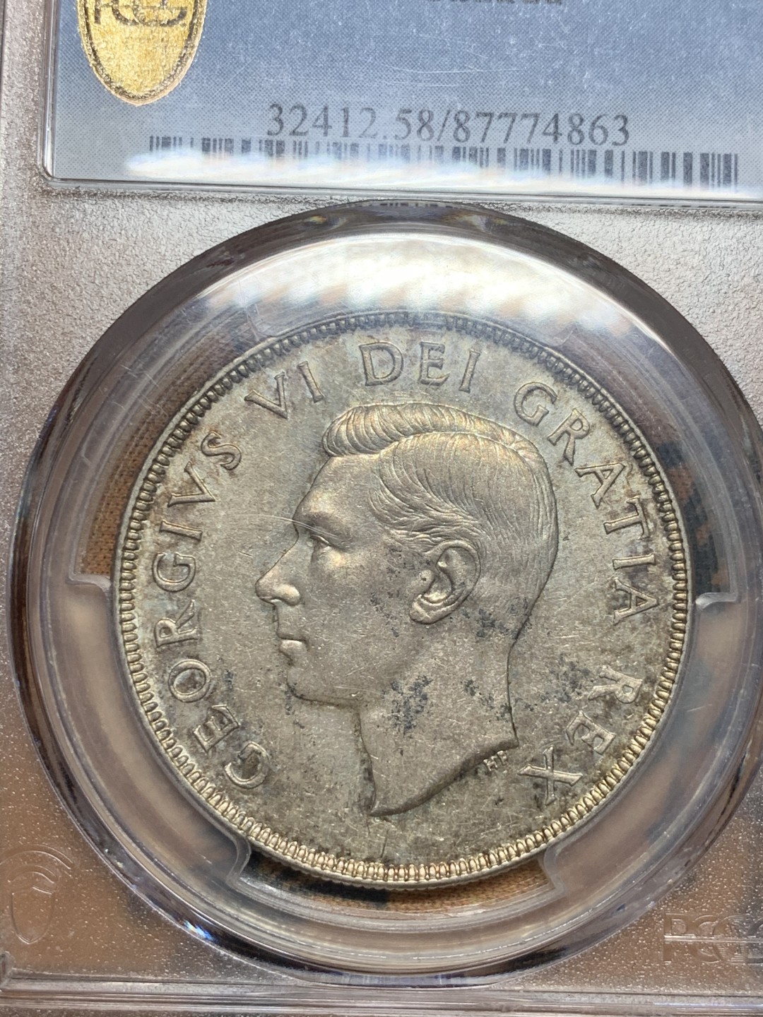 《竞宝斋》第52场-本周日，周一2场连拍（全场不限金额包邮） 1952年加拿大乔治六世划船银币 pcgs58分  划船热门品种 