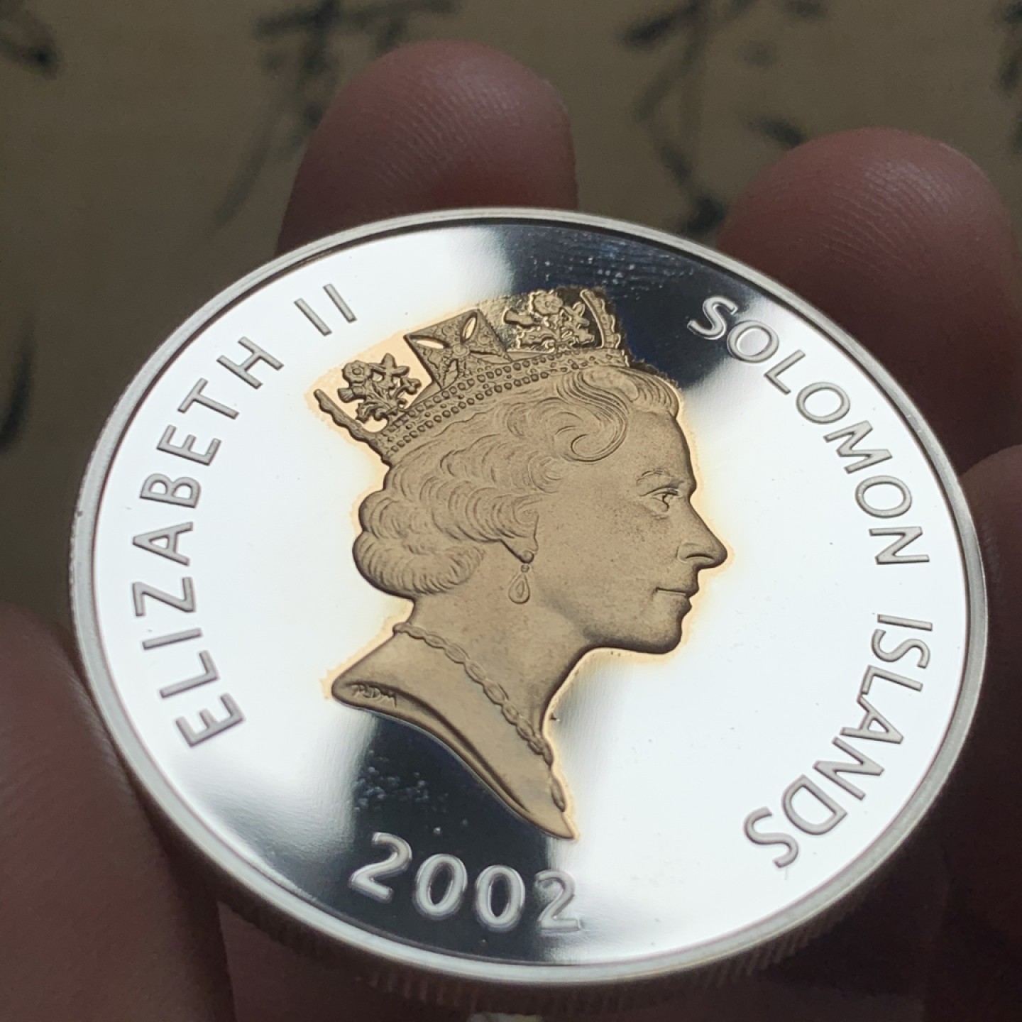 《竞宝斋》第52场-本周日，周一2场连拍（全场不限金额包邮） PF级 所罗门群岛2002克朗型5元镀金银币 议会开幕典礼 完美品相 