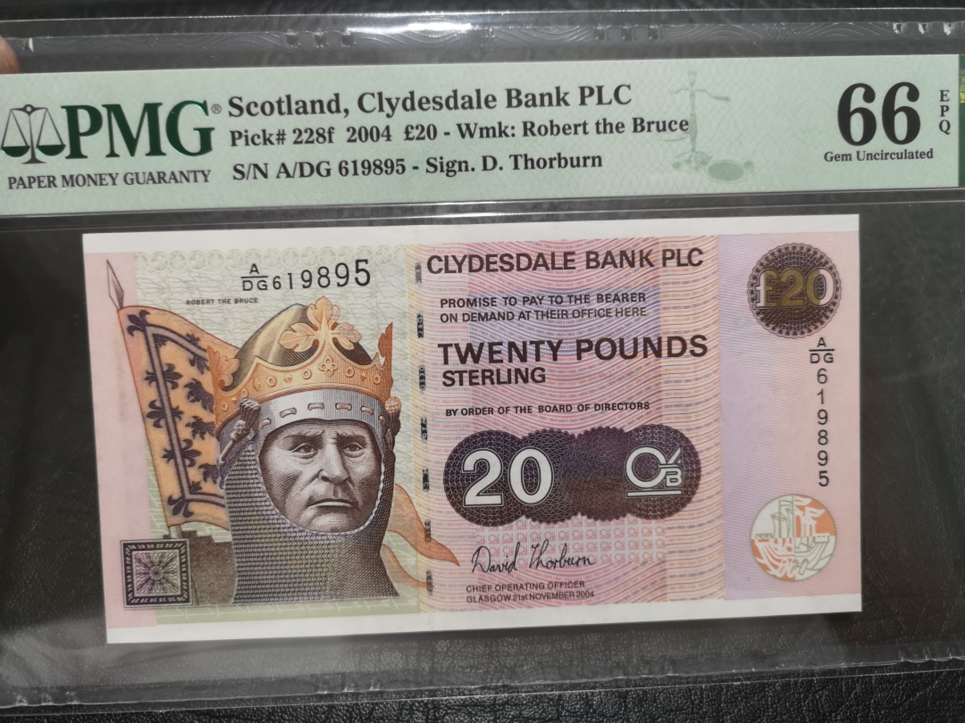 外钞收藏家》第一百七十六期拍卖 2004年苏格兰克莱斯戴尔银行20镑 PMG66 无47