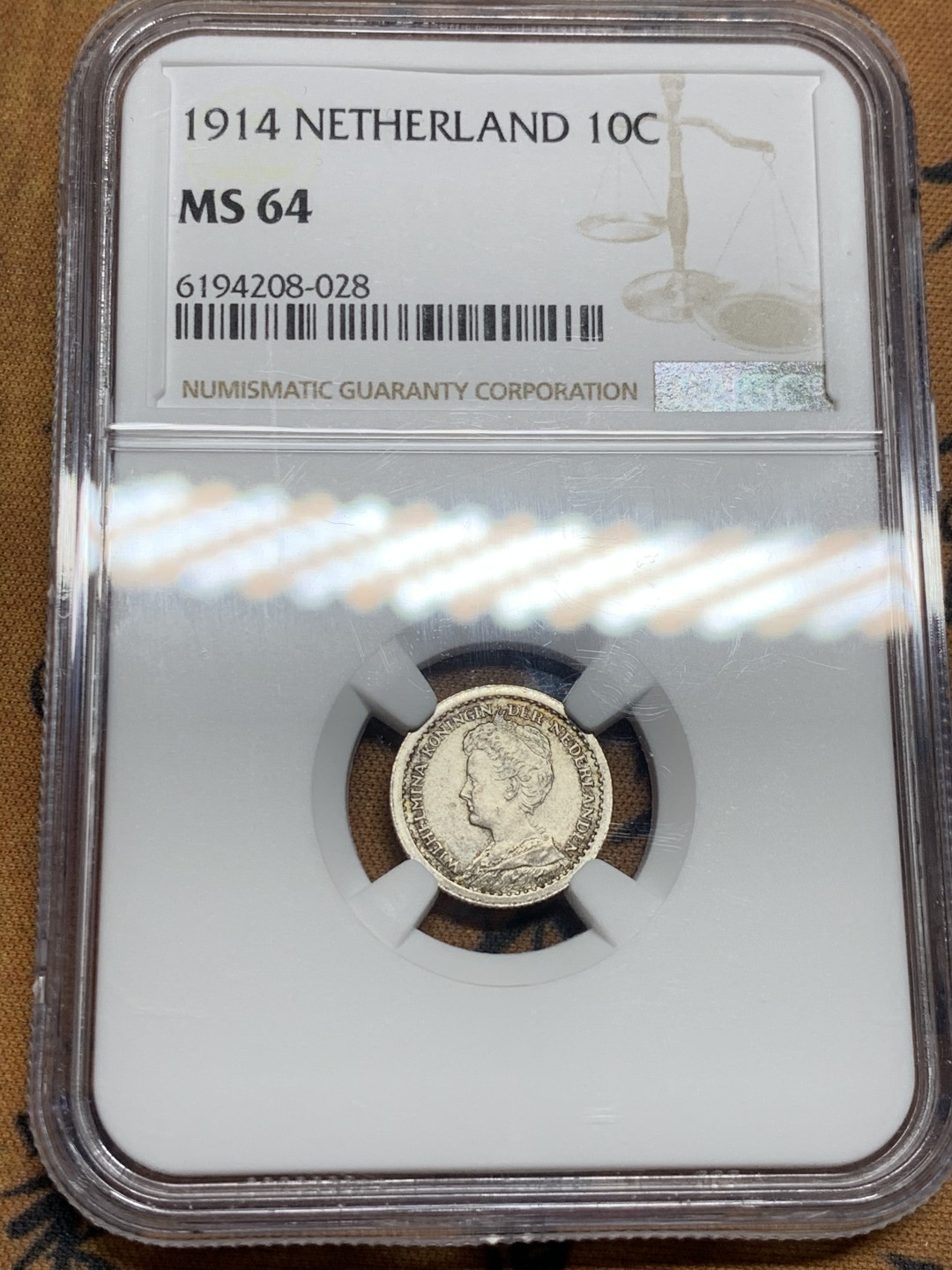 《竞宝斋》第52场-本周日，周一2场连拍（全场不限金额包邮） NGC-MS64 荷兰1914年10分银币 亚军分 老包浆高分不易 小萝莉初成人妻 风华绝代 