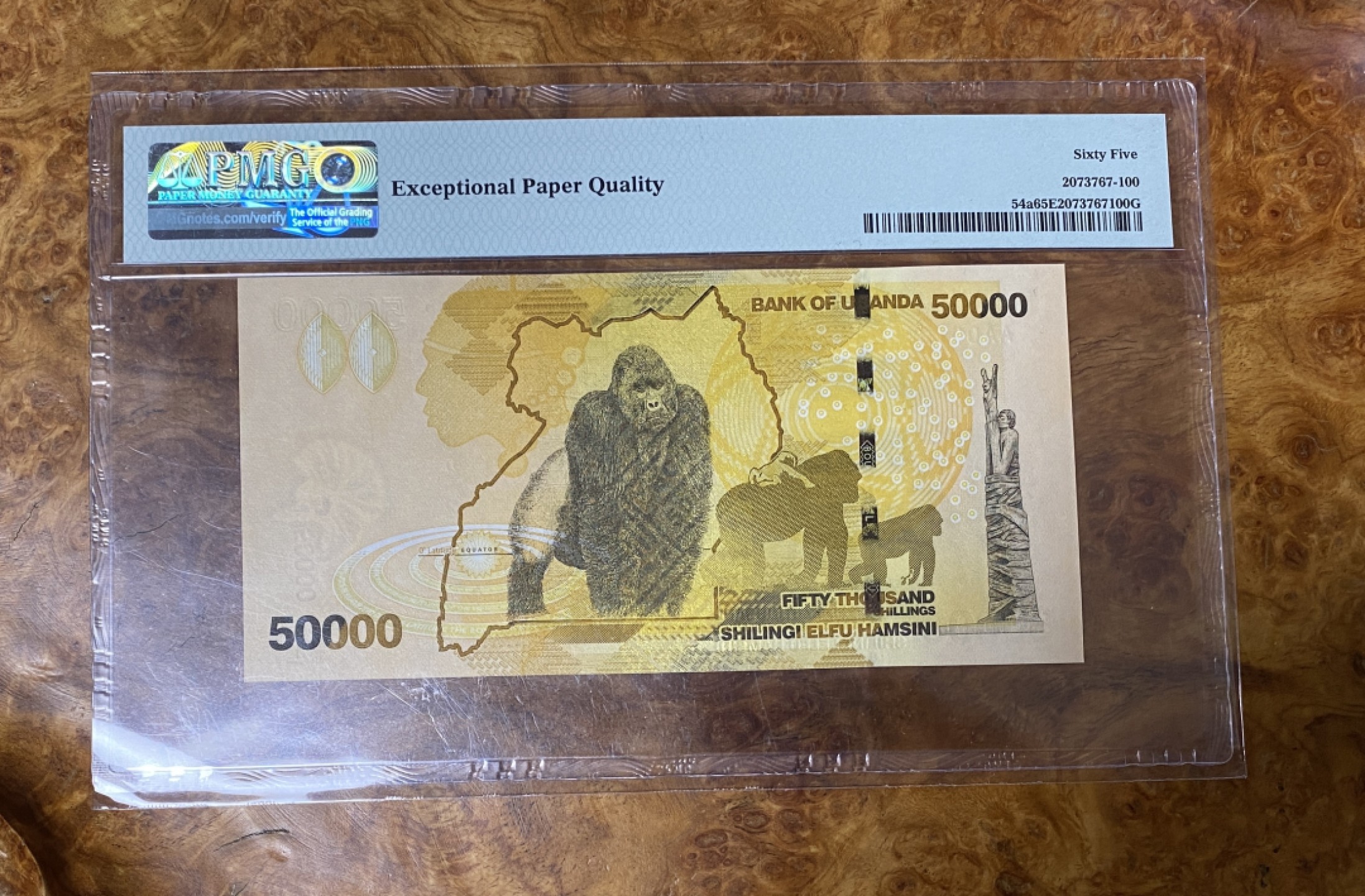 Chase Auction 第9期 - - 中外钱币、民国钞联拍！ 2010年乌干达50000先令，PMG65，AA冠，IBNS最佳纸币！