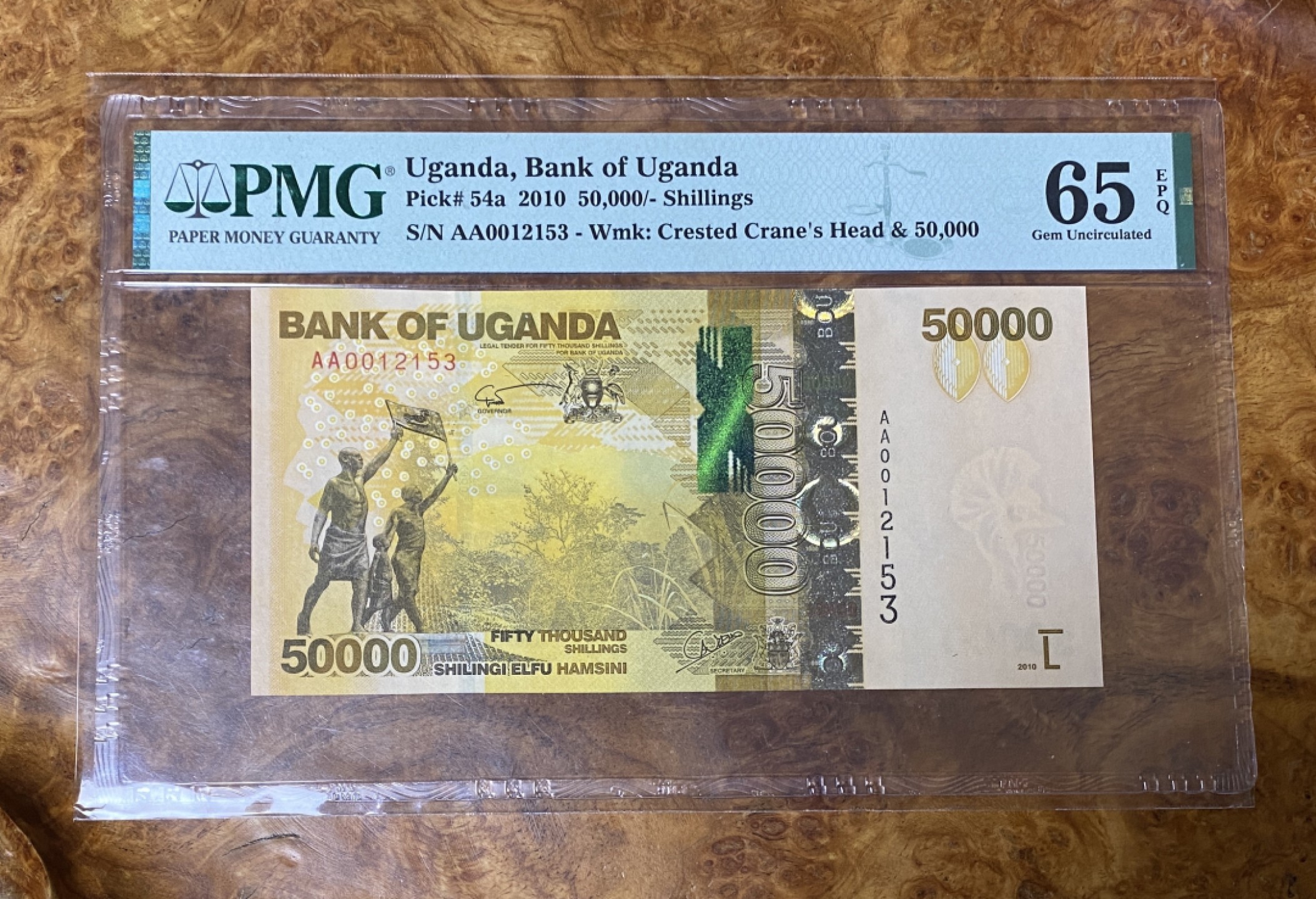 Chase Auction 第9期 - - 中外钱币、民国钞联拍！ 2010年乌干达50000先令，PMG65，AA冠，IBNS最佳纸币！