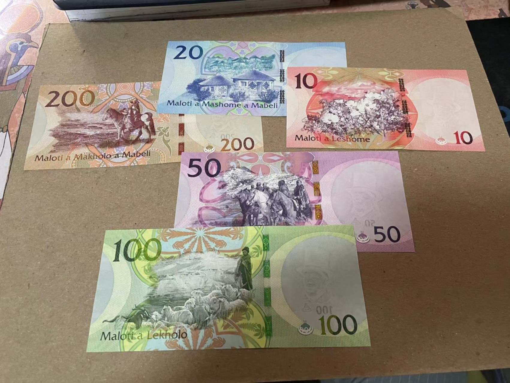 【Blue Auction】✨世界纸币精拍第180期（共73拍） 【一组5张】莱索托 2021年10-200马洛蒂 全新UNC