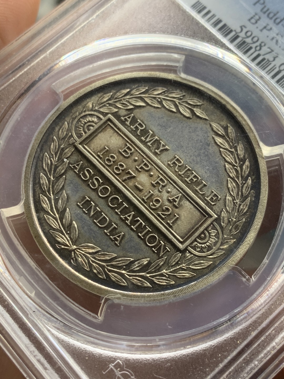 《竞宝斋》第53场（献给最美的劳动者，祝五一快乐！）-本周日，周一2场连拍（全场不限金额包邮） PCGS SP64 PCGS唯一冠军分 带红色原盒。英属印度 1921年 陆军步枪协会银奖章  J.Pinches名家作品 底板PL强烈 双面带彩 对狮子的刻画 矫健有力 栩栩如生 宛如活物