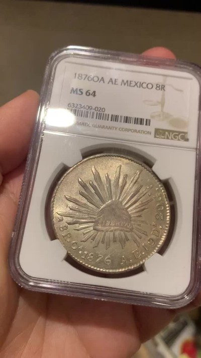 《竞宝斋》第54场-本周日，周一2场连拍（全场不限金额包邮） NGC MS64 稀少OA版 淡彩车轮光  墨西哥1876 鹰洋 银币 难得高分 OA裸币都是作为XF-AU的存在 这枚64分，毕业品种