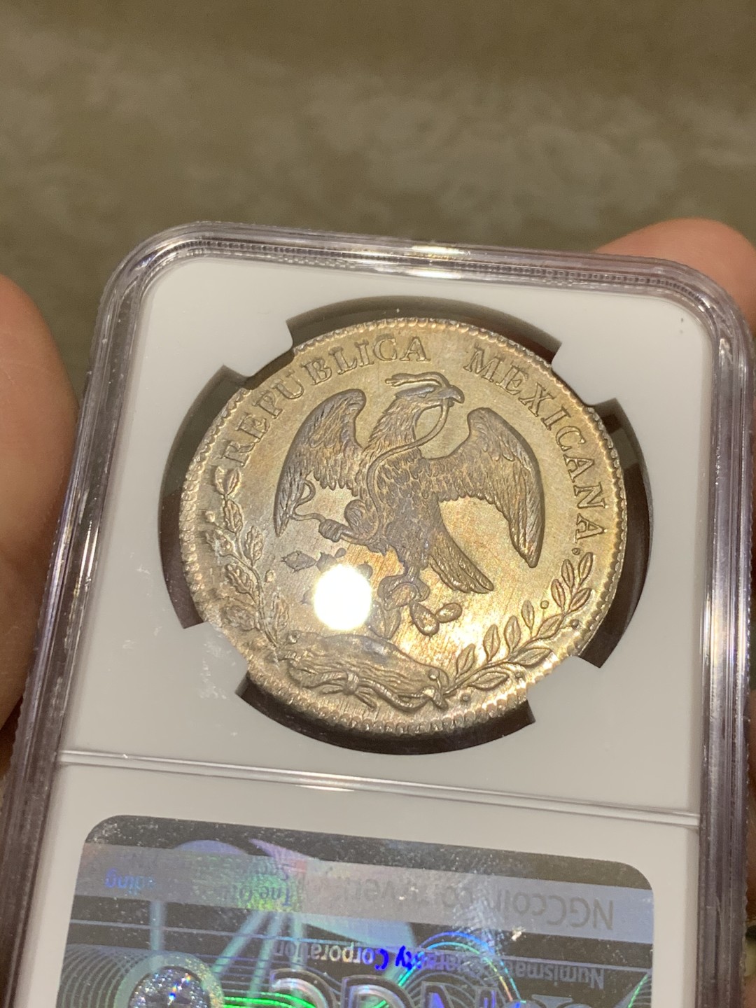 《竞宝斋》第54场-本周日，周一2场连拍（全场不限金额包邮） NGC MS64 稀少OA版 淡彩车轮光  墨西哥1876 鹰洋 银币 难得高分 OA裸币都是作为XF-AU的存在 这枚64分，毕业品种