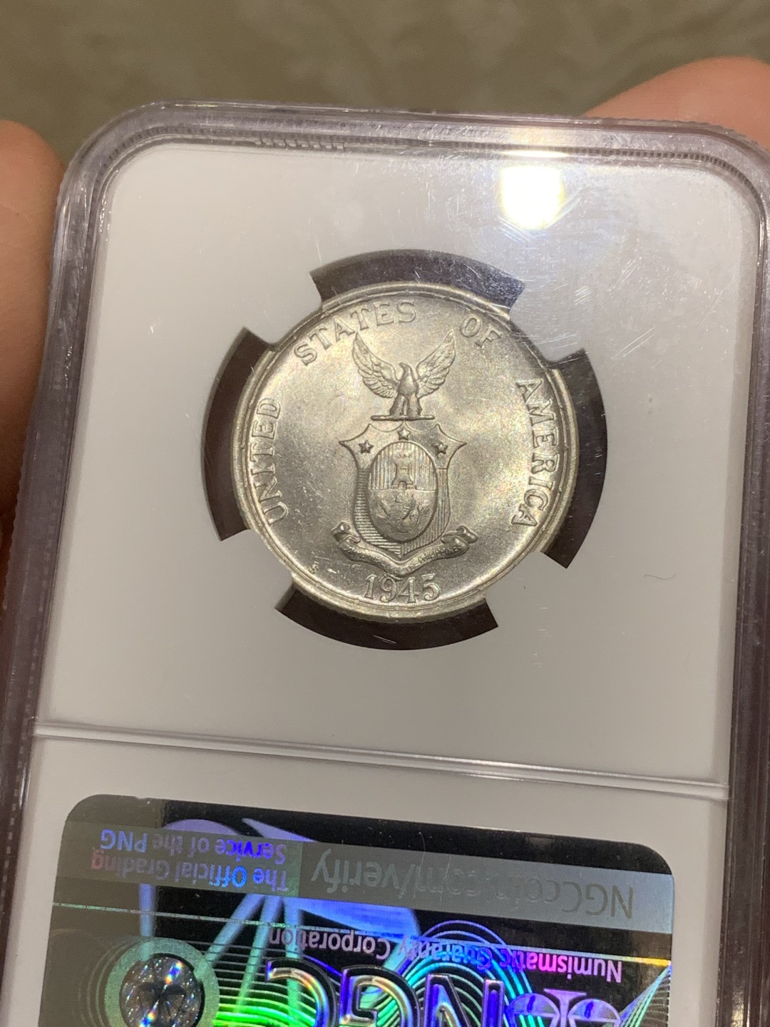 《竞宝斋》第54场-本周日，周一2场连拍（全场不限金额包邮） NGC-MS62+ 美属菲律宾 1945年 S版 打铁女神 50分 银币 底板和光度都不错