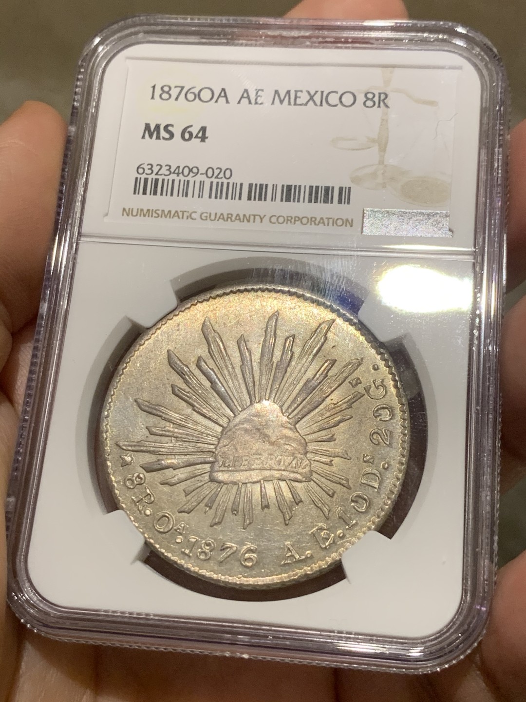 《竞宝斋》第54场-本周日，周一2场连拍（全场不限金额包邮） NGC MS64 稀少OA版 淡彩车轮光  墨西哥1876 鹰洋 银币 难得高分 OA裸币都是作为XF-AU的存在 这枚64分，毕业品种