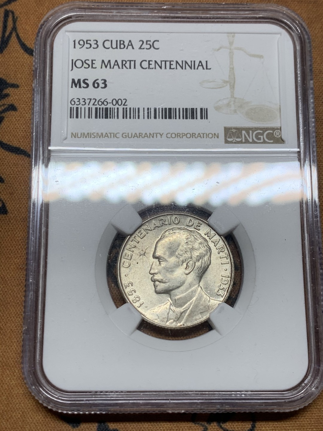 《竞宝斋》第54场-本周日，周一2场连拍（全场不限金额包邮） NGC-MS63 古巴1953年 马丁 25分 转光银币 值得收藏