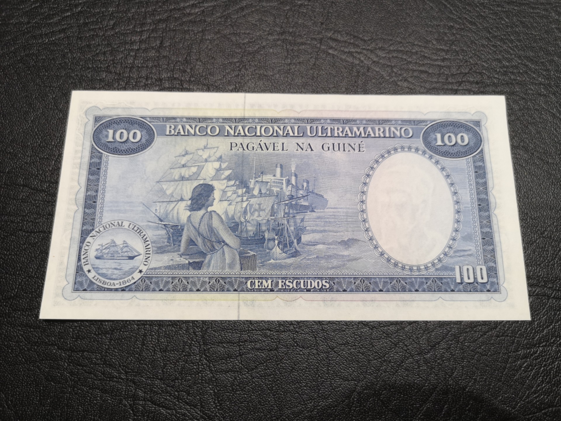 外钞收藏家》第一百七十七期拍卖 奥地利20先令和葡属几内亚100 两张一起 全新