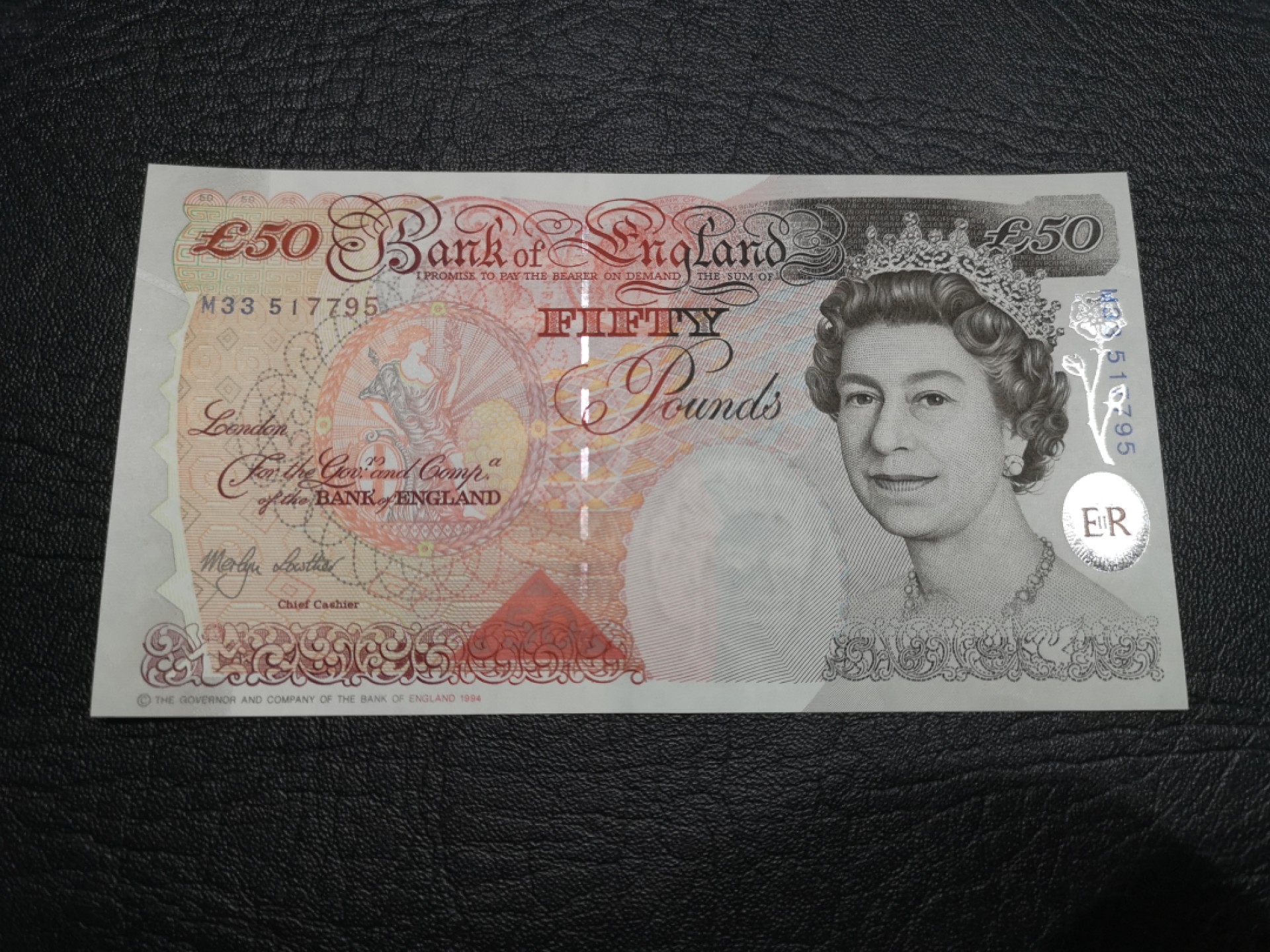 《外钞收藏家》第一百七十八期拍卖 英国E序列50镑 AU品相 如图详情