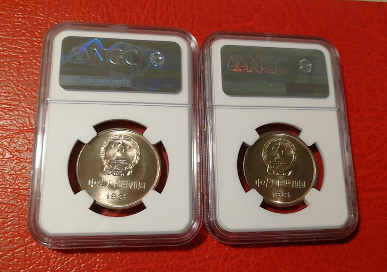 【华誉王者】1998期拍卖 81年长城币2枚，NGC66分，串号O36，O39。