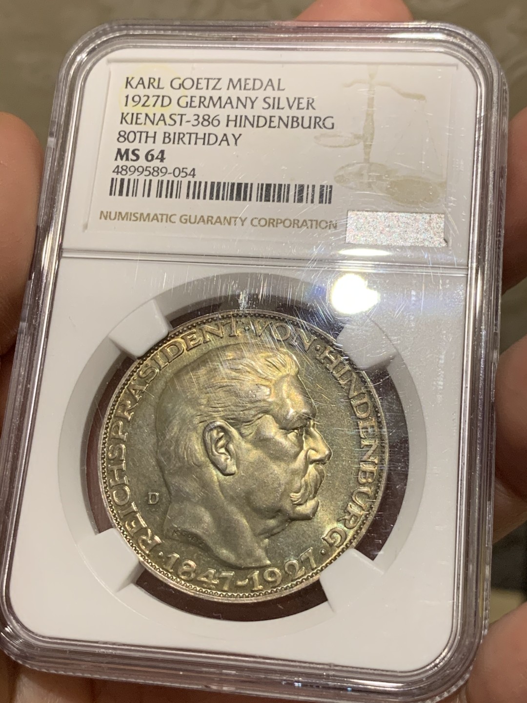 《竞宝斋》第55场-本周日，周一2场连拍（全场不限金额包邮） NGC-MS64 1927年德国兴登堡5马克币型章 卡尔哥茨作品，金彩包浆，PL底板，状态极佳