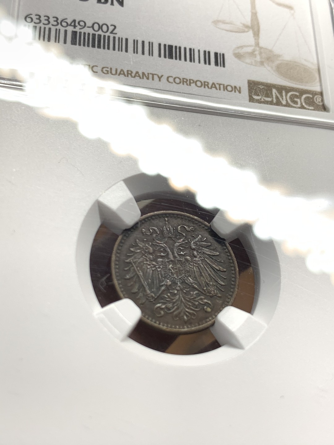 《竞宝斋》第55场-本周日，周一2场连拍（全场不限金额包邮） NGC AU53 唯一亚军 奥匈帝国 1893年 1赫勒 辅币难得