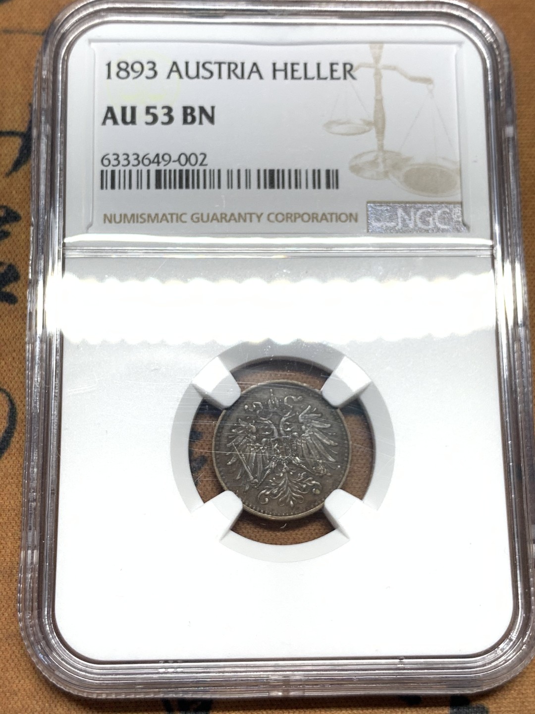 《竞宝斋》第55场-本周日，周一2场连拍（全场不限金额包邮） NGC AU53 唯一亚军 奥匈帝国 1893年 1赫勒 辅币难得