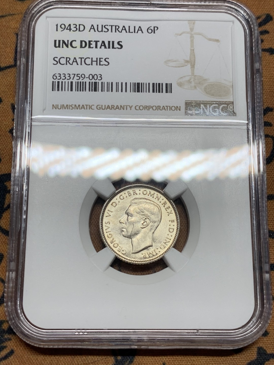 《竞宝斋》第55场-本周日，周一2场连拍（全场不限金额包邮） NGC UNC 澳大利亚 1943年 乔六 6便士 银币 不常见的品种