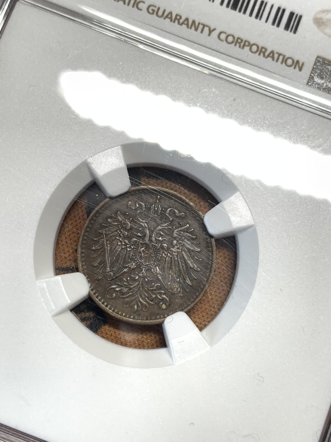 《竞宝斋》第55场-本周日，周一2场连拍（全场不限金额包邮） NGC AU53 唯一亚军 奥匈帝国 1893年 1赫勒 辅币难得