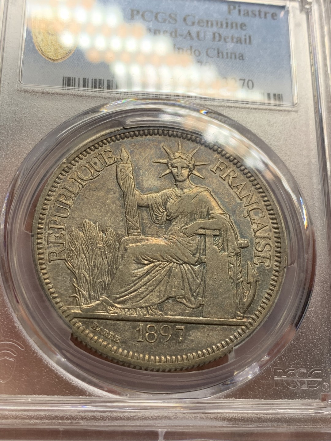 《竞宝斋》第55场-本周日，周一2场连拍（全场不限金额包邮） PCGS AUD 1897 法属印度支那1皮 银币 深彩包浆，难得状态