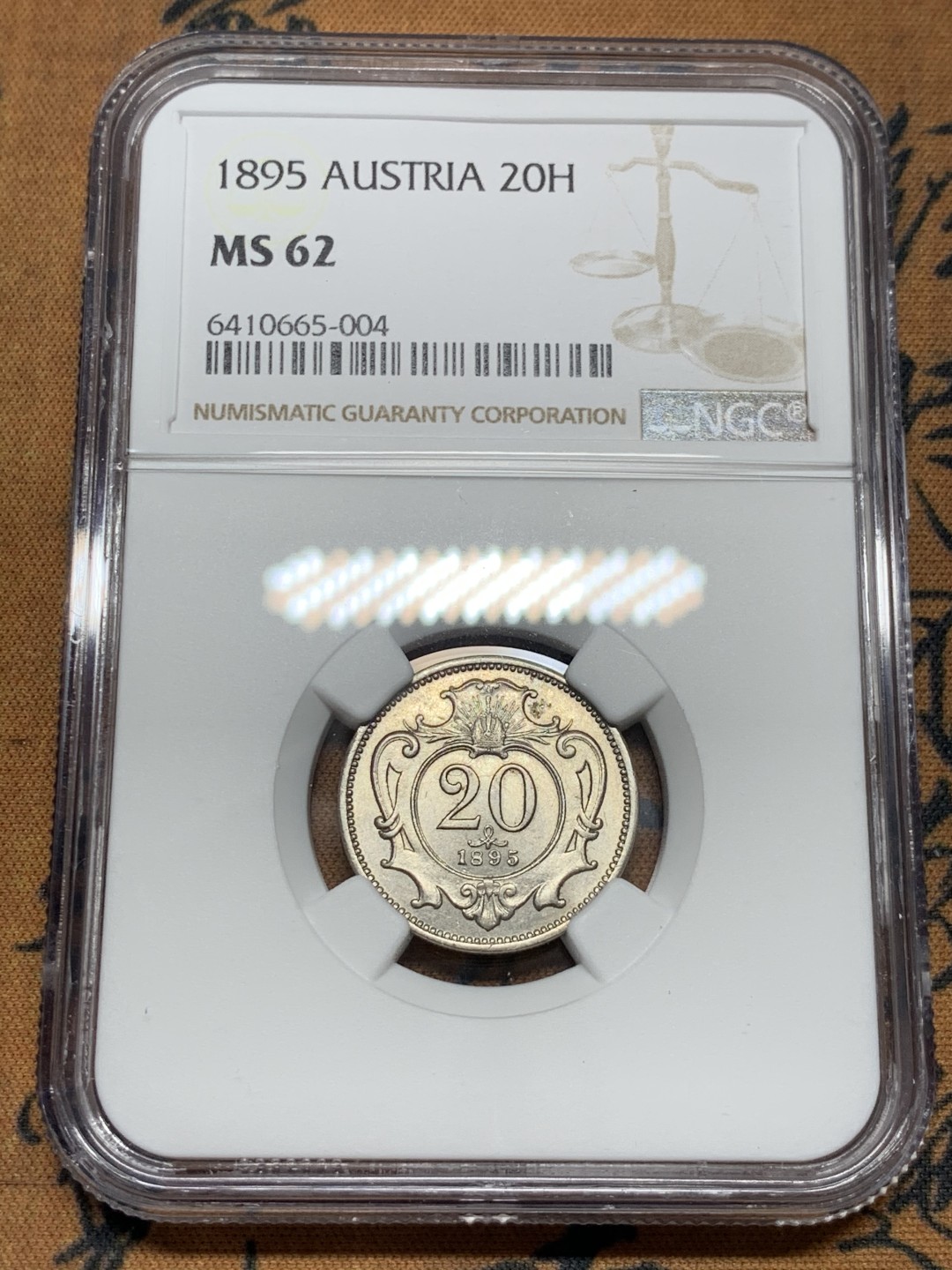 《竞宝斋》第55场-本周日，周一2场连拍（全场不限金额包邮） NGC MS62 唯一冠军 奥匈帝国 1895年 20赫勒 一枚毕业