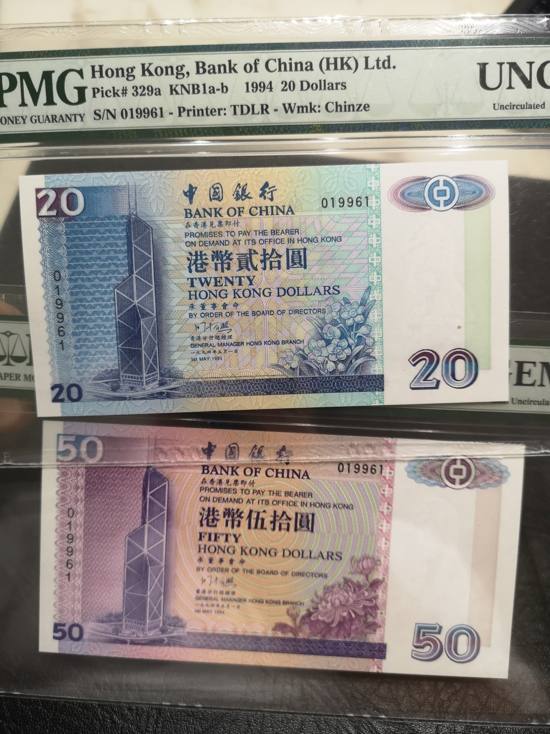 《外钞收藏家》第一百八十期拍卖 1994年中国银行五张一套 全同号 靓号 PMG封装 带精装大册子