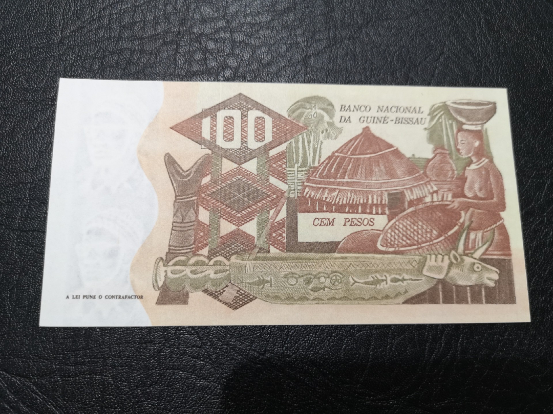 《外钞收藏家》第一百七十八期拍卖 几内亚比绍100比索 近全新 无折 有受潮 无47