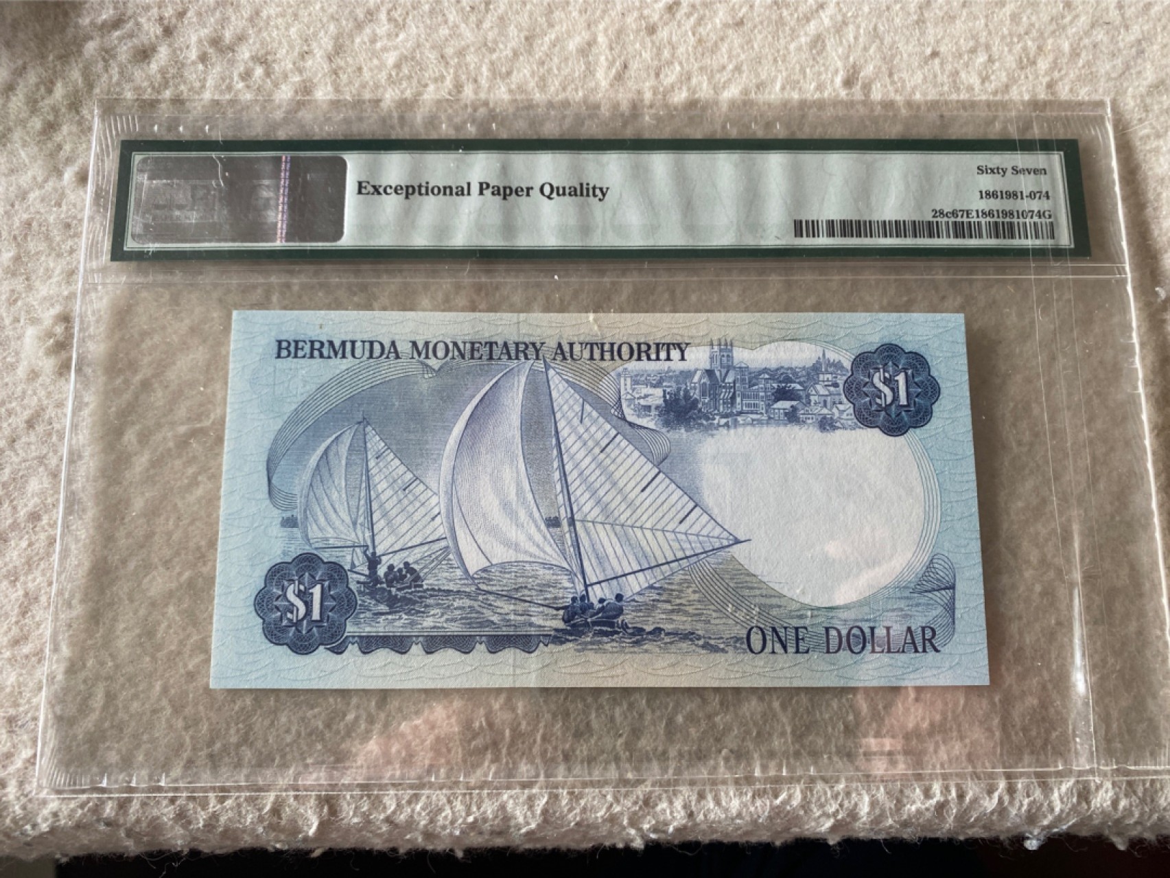 收藏联盟第163期拍卖 外国钞场 今晚七点不见不散 1986年英属百慕大群岛1元 两位19小号 PMg67E