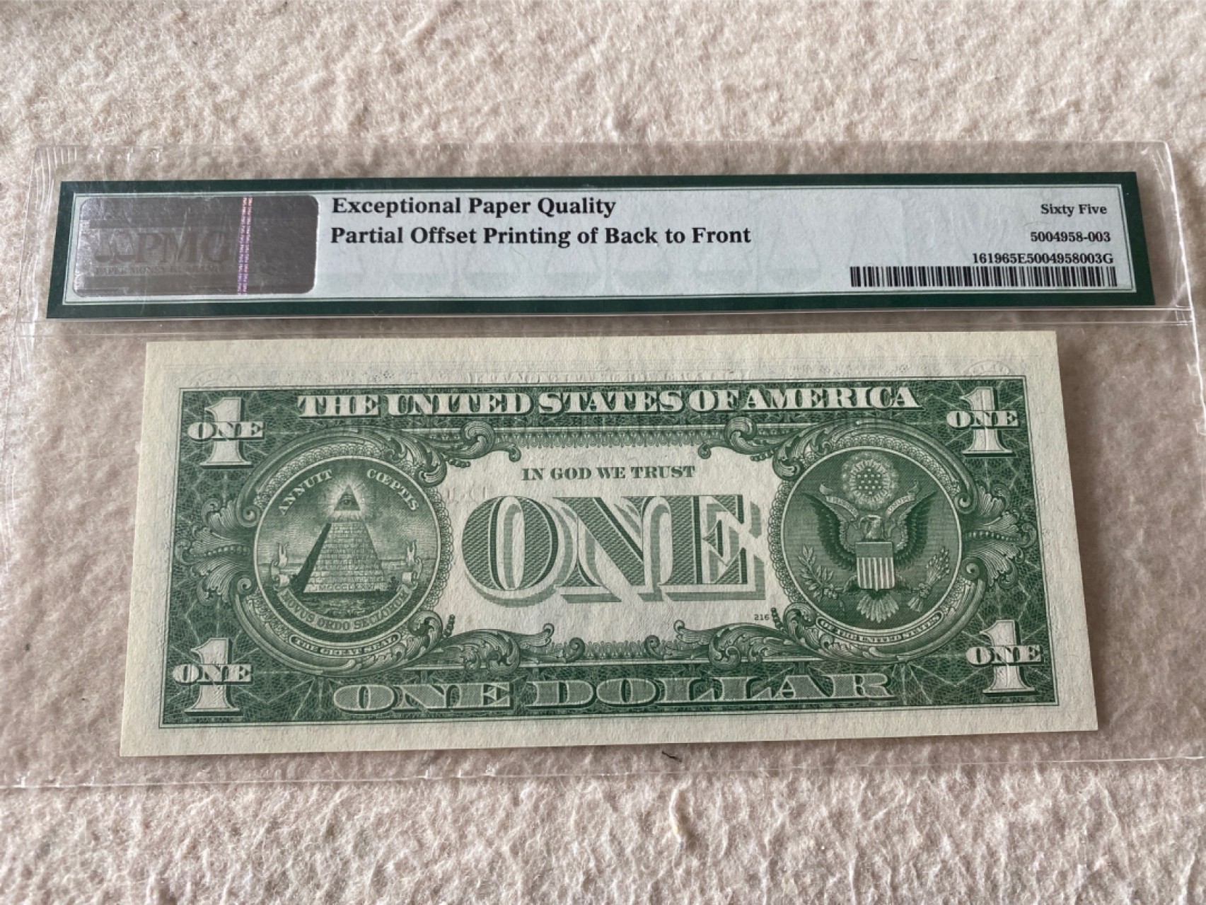 收藏联盟第163期拍卖 外国钞场 今晚七点不见不散 1957年美国1元银元券 背面漏印于正面错钞 PMG65E