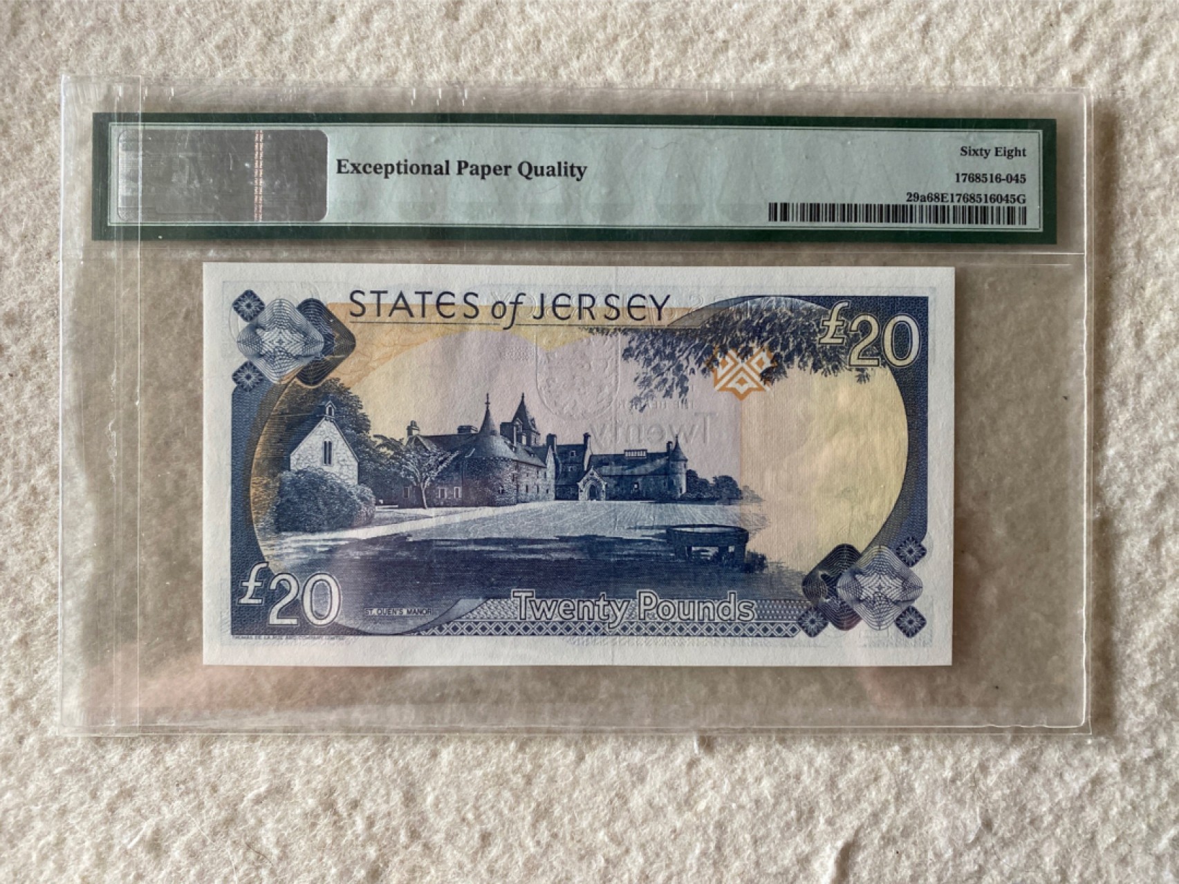 收藏联盟第163期拍卖 外国钞场 今晚七点不见不散 2000年英属泽西岛20镑 百位小号 PMG68E