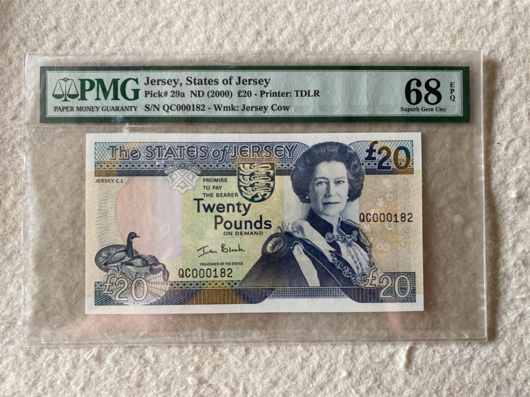 收藏联盟第163期拍卖 外国钞场 今晚七点不见不散 2000年英属泽西岛20镑 百位小号 PMG68E