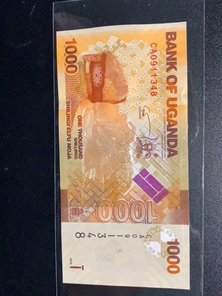 北极狼收藏11$ 非洲 乌干达2017年版1000先令独立纪念碑世界最美纸币赤羚