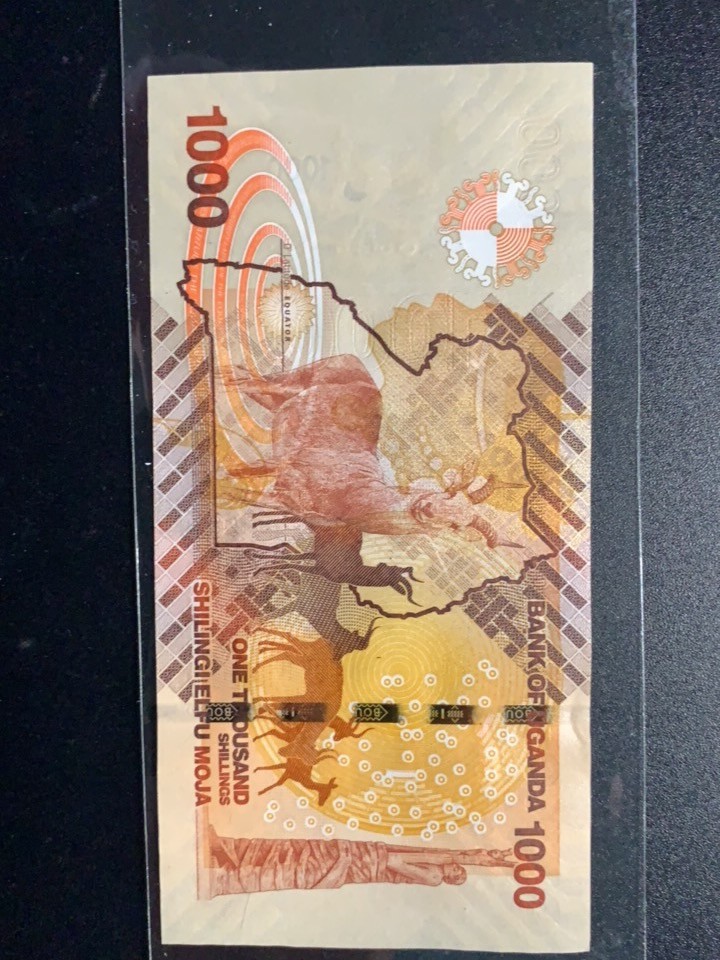 北极狼收藏11$ 非洲 乌干达2017年版1000先令独立纪念碑世界最美纸币赤羚