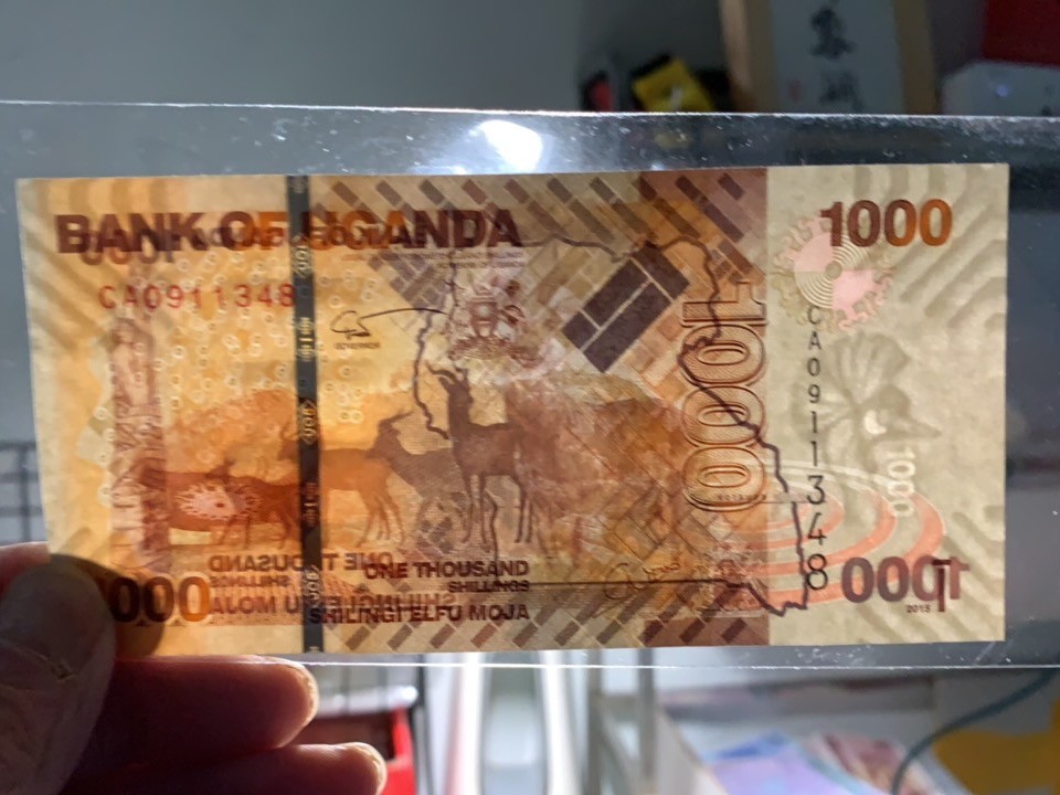 北极狼收藏11$ 非洲 乌干达2017年版1000先令独立纪念碑世界最美纸币赤羚