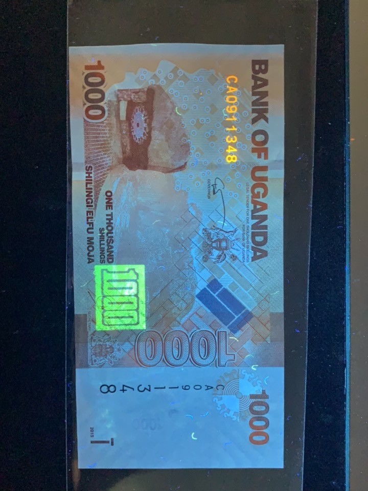 北极狼收藏11$ 非洲 乌干达2017年版1000先令独立纪念碑世界最美纸币赤羚