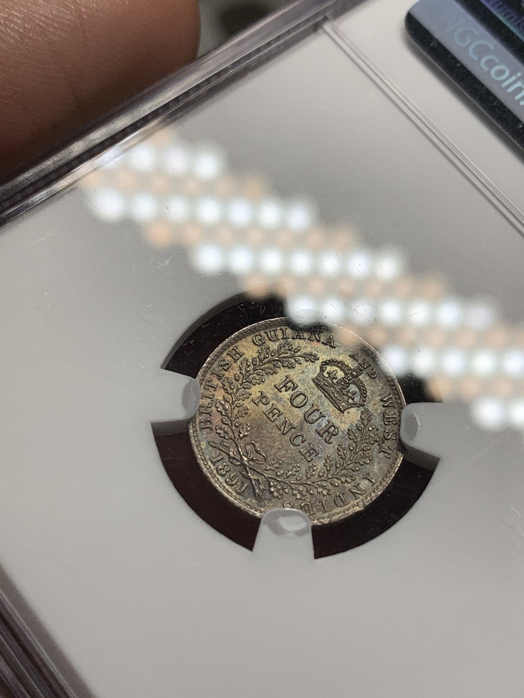 《竞宝斋》第59场-本周日，周一2场连拍（全场不限金额包邮） NGC MS64 英属圭亚那及西印度 维多利亚女皇 1891年 4便士银币 双面均匀五彩包浆美品 同分品种在2014年HA成交价为123美元