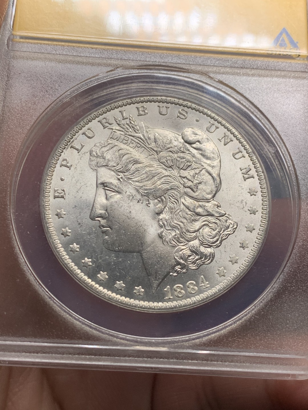 《竞宝斋》第59场-本周日，周一2场连拍（全场不限金额包邮） 1884-O 摩根银币 ANACS MS64分 强转光暴光好品