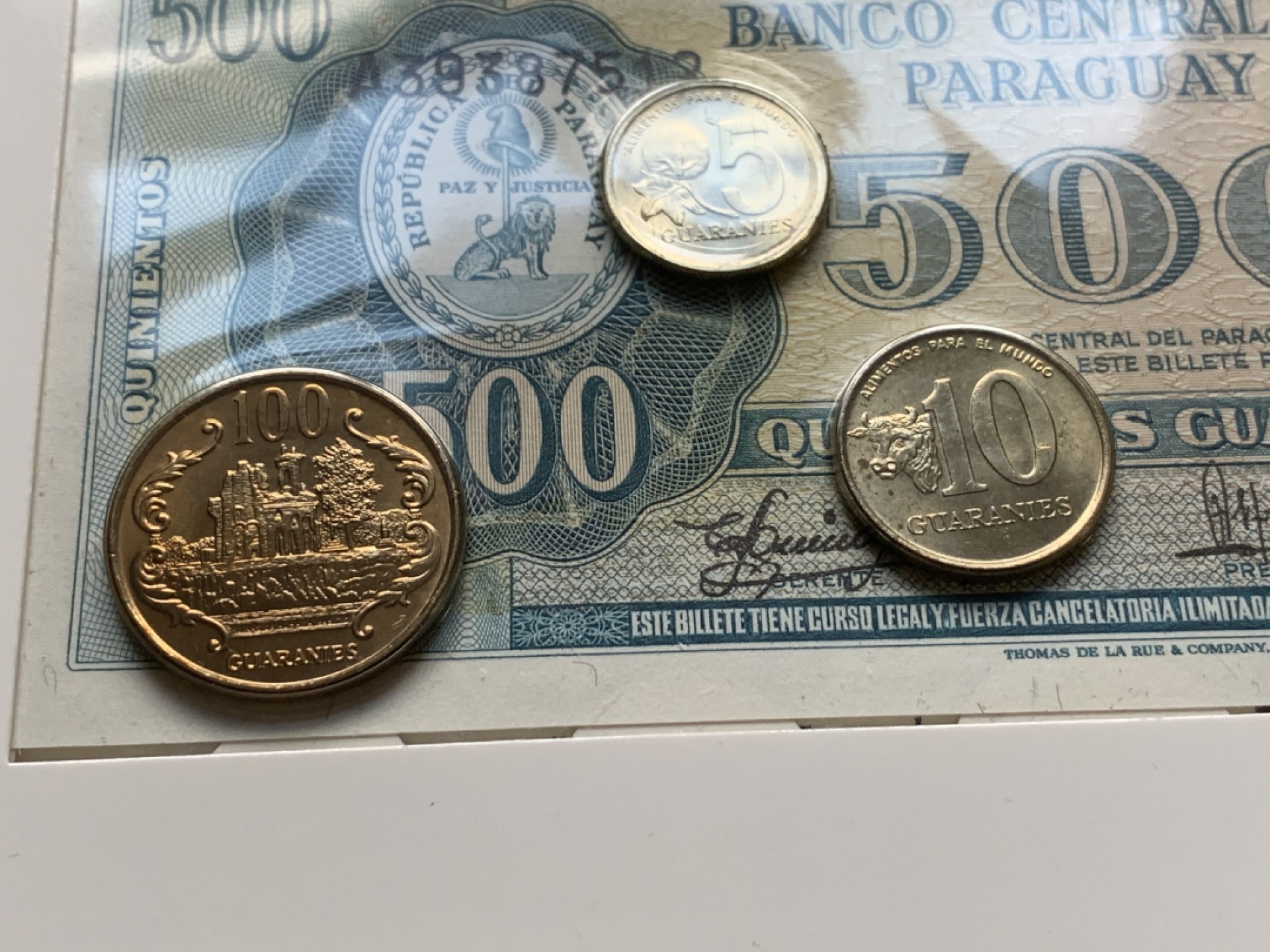 《竞宝斋》第59场-本周日，周一2场连拍（全场不限金额包邮） 卡装巴拉圭硬币一组5枚，纸币500瓦拉尼一张 全品