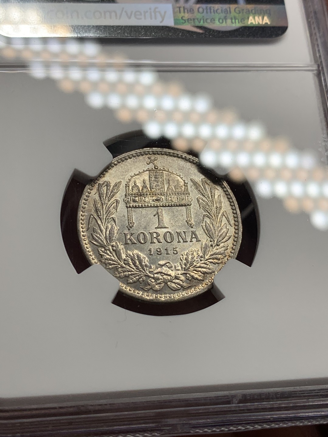 《竞宝斋》第59场-本周日，周一2场连拍（全场不限金额包邮） NGC-MS62 匈牙利 1915年 歪皇冠 1克朗银币 淡彩高细节