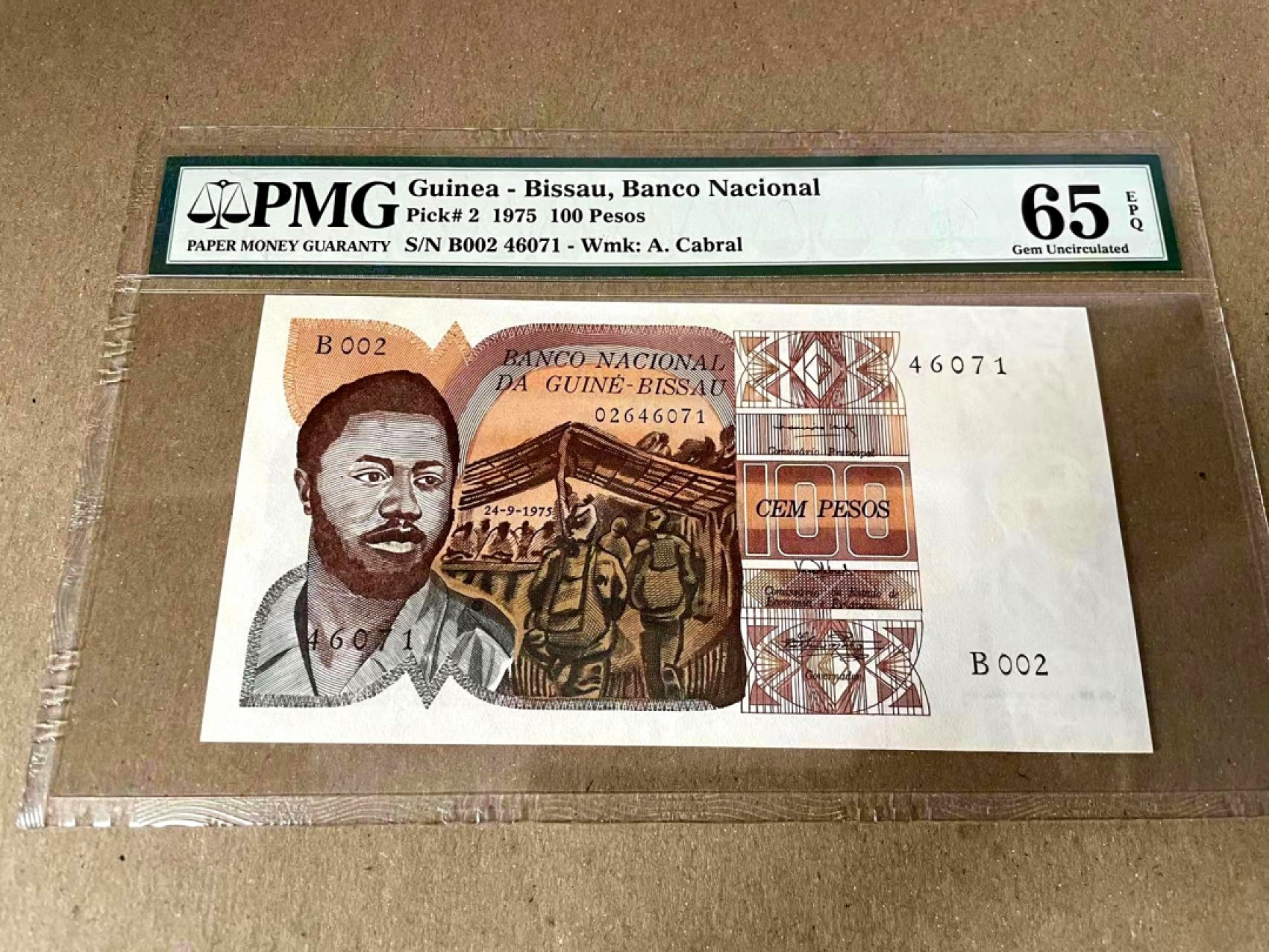 【Blue Auction】✨世界纸币精拍第186期——唯一冠军曼左尼（共77拍） 【p2首套纸币】几内亚比绍 1975年100比索 PMG65EPQ 绝品 风土人情抽象艺术