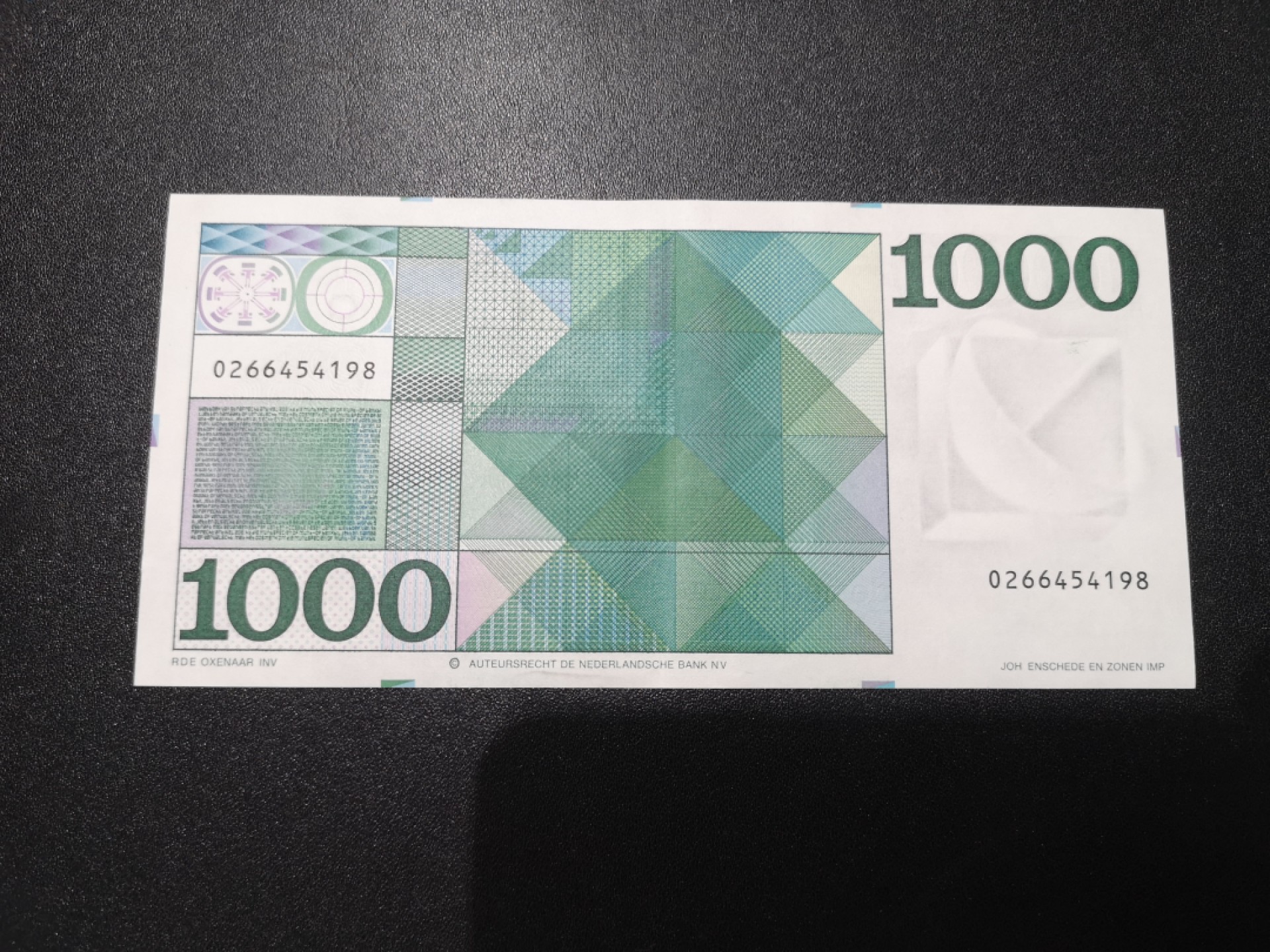 《外钞收藏家》第一百七十九期拍卖 荷兰人像版1000盾 AU品相 如图 中间有折 其他没问题