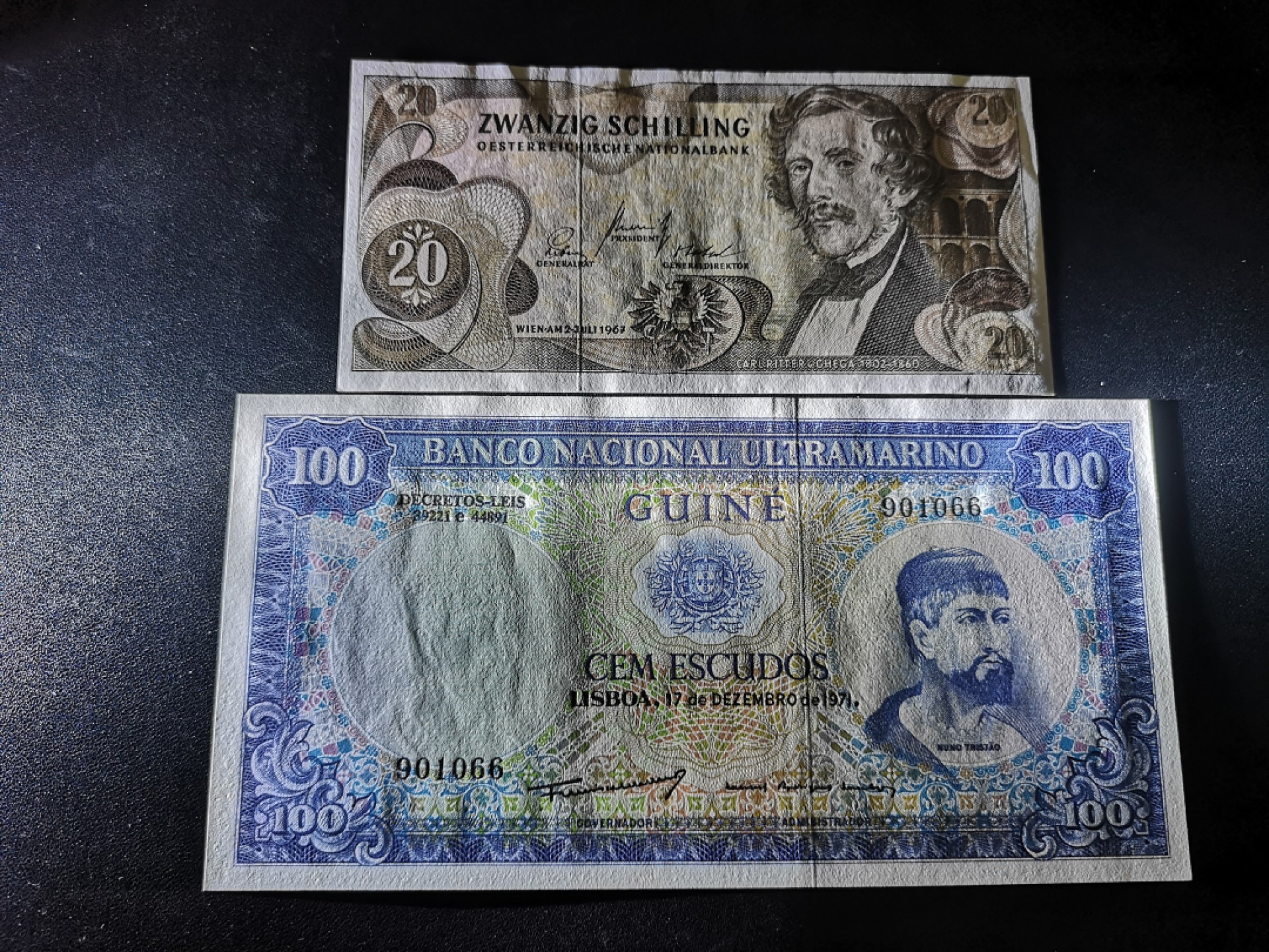 《外钞收藏家》第一百七十九期拍卖 奥地利20先令和葡属几内亚100 两张一起 全新 奥地利有轻微压痕
