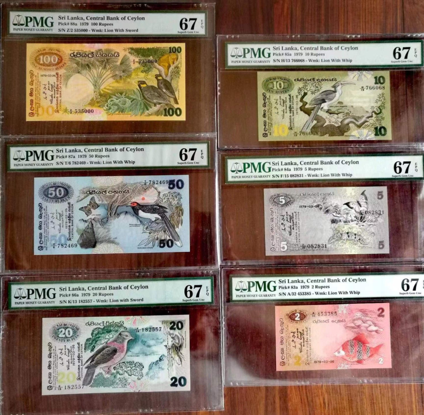  【Blue Auction】世界纸币精拍第187期——印度新金山渣打银行 （共90拍）  【一组6张全套 大金鸟为000豹子号】斯里兰卡 1979年 经典花鸟套 2-100卢比 均PMG67EPQ 高分