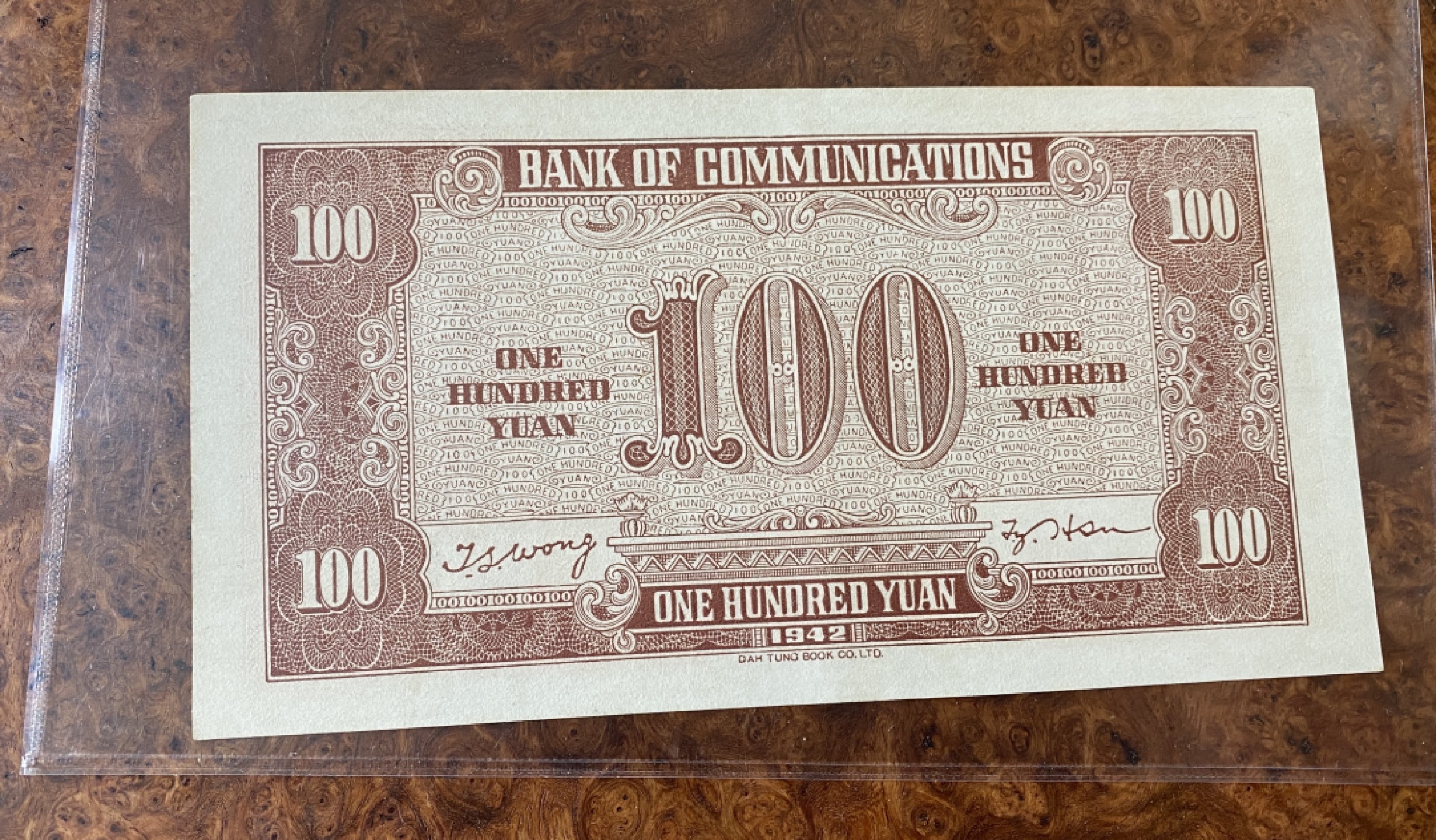 Chase Auction 第12期 - - 中外纸钞、民国炒联拍！ 1942年民国交通银行100元，大东版，火车轮船，品相如图！