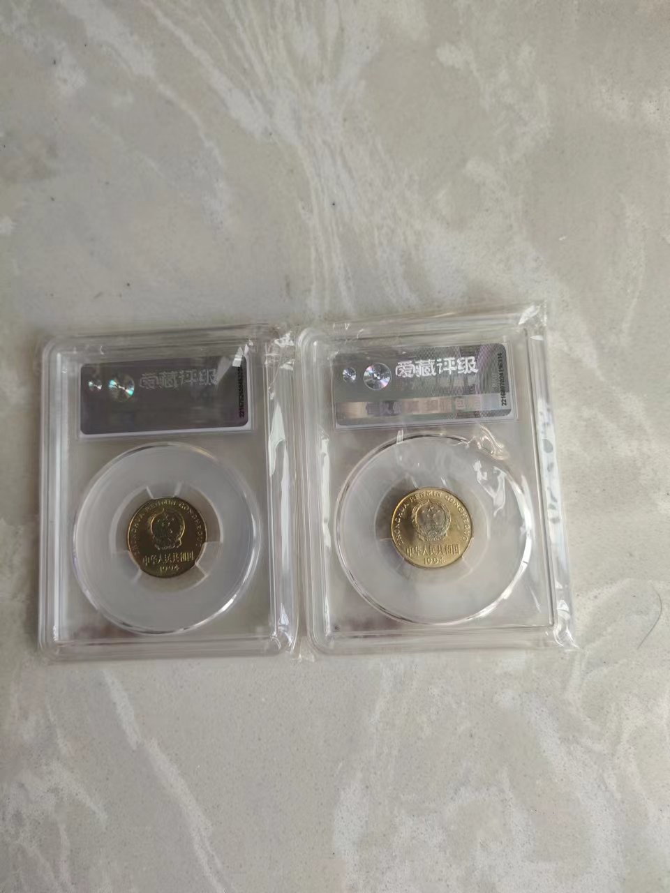 【华誉王者】2024期拍卖 爱藏评级94手雕版2枚合拍，串号随机