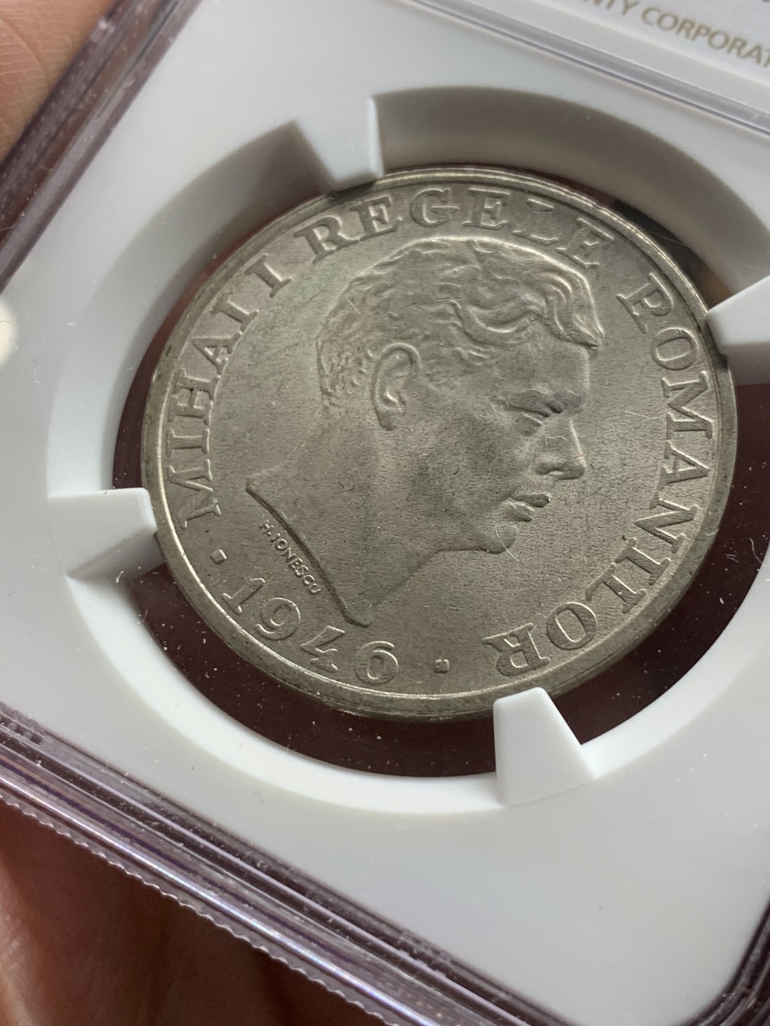 《竞宝斋》第63场-本周日 （全场不限金额包邮） NGC-MS61 罗马尼亚 1946年 25000列伊 银币 原光好品